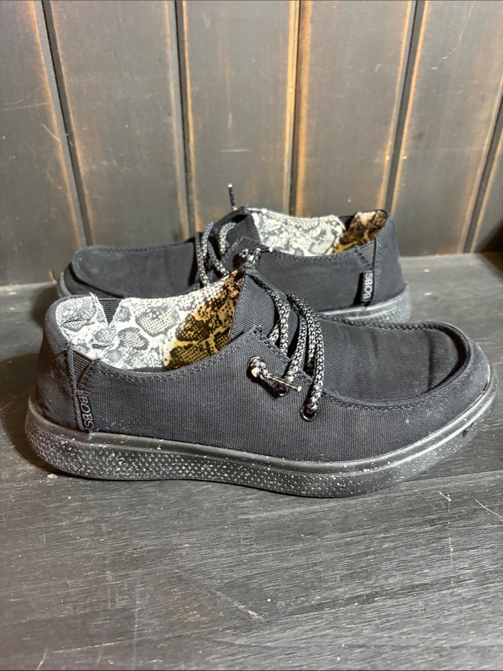 Bobs canvas slip on snake like lining.